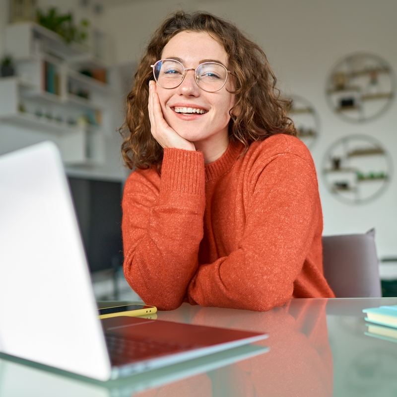 Young,Happy,Pretty,Business,Woman,Student,Sitting,At,Desk,At