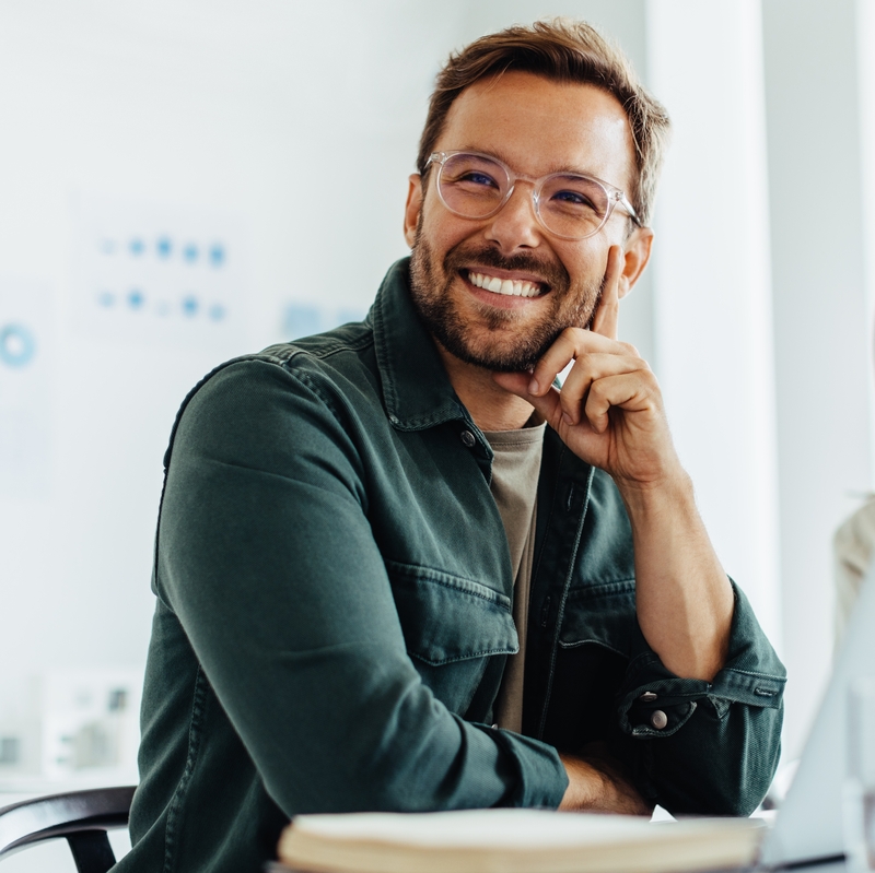 Business,Man,Listening,To,A,Discussion,During,A,Meeting,In
